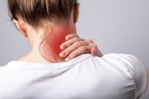 Woman With Cervical Radiculopathy (Pinched Nerve in Neck) - Symptoms of Cervical Radiculopathy