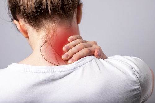 Woman With Cervical Radiculopathy (Pinched Nerve in Neck) - Symptoms of Cervical Radiculopathy