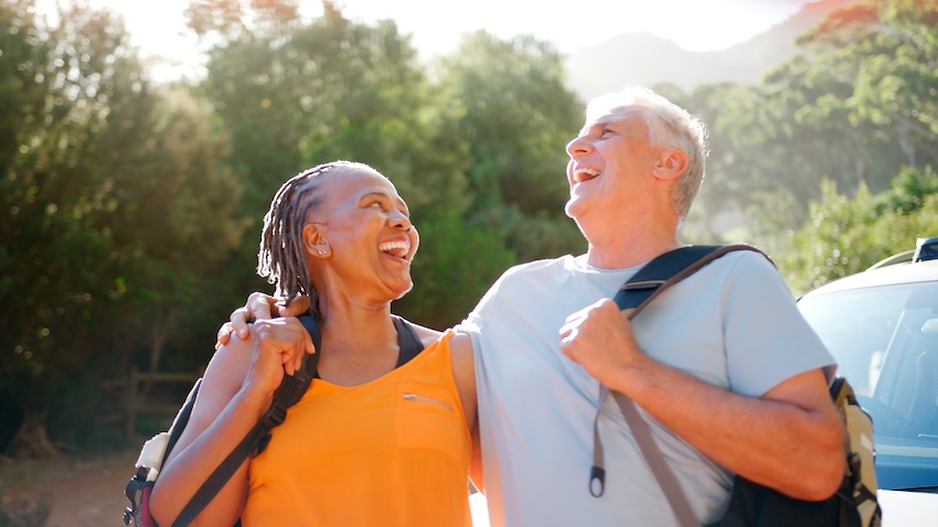 Active senior couple hiking pain-free after successful PRP therapy treatment at Verisipine Atlanta