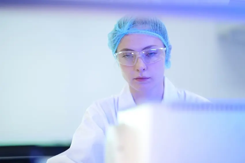 Patient working with physical therapist during recovery after stem cell therapy showing improved mobility and pain relief at VeriSpine Georgia 